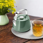 Load image into Gallery viewer, Caraway 2 Quart Whistling Tea Kettle - Durable Stainless Steel Tea Pot - Fast Boiling, Stovetop Agnostic - Non-Toxic, PTFE &amp; PFOA Free - Includes Pot Holder - Sage