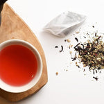 Load image into Gallery viewer, Grace Farms HERBAL TEA VARIETY Box (12 Enveloped Sachets) | 4 Naturally Sweet, Caffeine Free Flavors | Chamomile Citrus, Hibiscus Orange, Spearmint Rose, &amp; Rooibos Chai | Organic, Fair Trade &amp; Kosher | Gives Back 100% of Profits