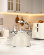 Load image into Gallery viewer, Harriet Tea Kettle Stovetop, 2.5 Quart Whistling Stainless Steel Tea Pot, 3-Layer Base, Unique Ergonomic Handle, Includes Pot Holder &amp; Mat, Electric/Induction/Gas Stovetops Applicable, Beige White