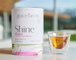 Load image into Gallery viewer, Grace Farms SHINE Wellness Organic Tea Blend (16 Pyramid Sachets) | Hydrating Tea For Skin and Detox | Rooibos, Rosehips, Hibiscus, Tulsi, and Haritaki | Fairtrade and Kosher | Gives Back 100% of Profits