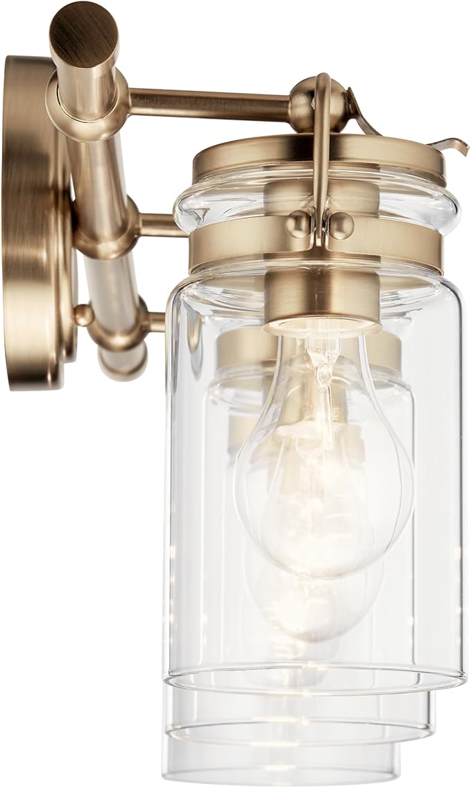 Kichler, Brinley 24" 3 Light Vanity Light with Clear Glass in Champagne Bronze for Bathroom and Powder Room, (24" W x 10.25" H), 45689CPZ