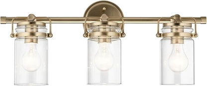 Kichler, Brinley 24" 3 Light Vanity Light with Clear Glass in Champagne Bronze for Bathroom and Powder Room, (24" W x 10.25" H), 45689CPZ