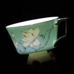 Load image into Gallery viewer, KAMMAK Ceramic Coffee Cups Saucers Set of 2, Porcelain Espresso Cups with Saucers, 8.12 oz Handcrafted Elegant Bone China Tea Cups, Blue &amp; Sage Green Flower Teacup for Party, Office, Women Gift