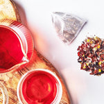 Load image into Gallery viewer, Grace Farms SHINE Wellness Organic Tea Blend (16 Pyramid Sachets) | Hydrating Tea For Skin and Detox | Rooibos, Rosehips, Hibiscus, Tulsi, and Haritaki | Fairtrade and Kosher | Gives Back 100% of Profits