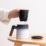 Load image into Gallery viewer, ZENS Tea Cup with Infuser and Lid, Wood Handle Loose Steeper Mug, 12 Ounces Matte Gradient Embossed Ceramic Stainer Mug for Tea Gifts, Black &amp; White