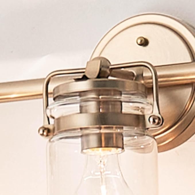 Kichler, Brinley 24" 3 Light Vanity Light with Clear Glass in Champagne Bronze for Bathroom and Powder Room, (24" W x 10.25" H), 45689CPZ