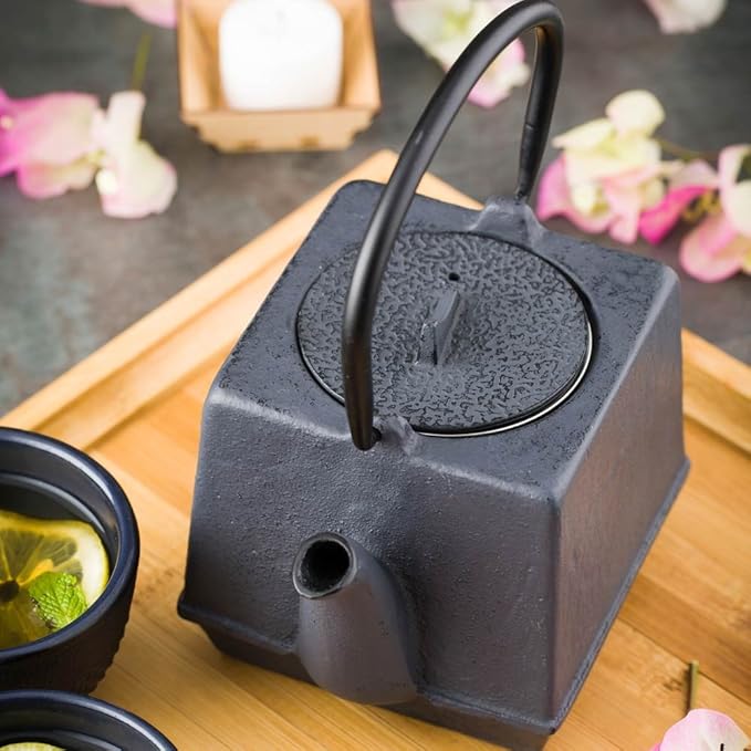 Restaurantware Tetsubin 27 Ounce Cast Iron Teapot 1 Cube Iron Teapot - With Strainer Retains Heat Black Cast Iron Japanese Tea Kettle Curved Handle