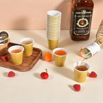 Load image into Gallery viewer, 100 Pack 2 oz Plastic Shot Glasses Disposable Shot Cups, Mini 2oz Party Cups for Graduation, Christmas, Birthday, Wedding, Bachelorette Party (Gold)