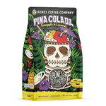 Load image into Gallery viewer, Bones Coffee Company Pina Colada, Pineapple and Coconut Flavored Coffee, Medium Roast Low Acid Arabica Beans Compatible with Auto drip and French Press Coffee Maker, 12 Oz Whole Bean