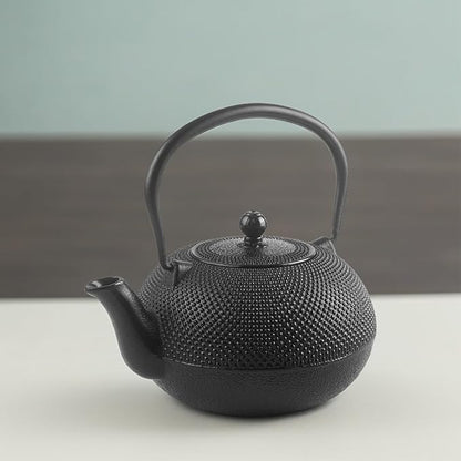 IBILI 40 Oz Cast Iron Teapot with Infuser | Made in Spain | Hammered Texture, Enameled Interior, Stovetop & Induction Compatible, Japanese Kettle for Loose Leaf Tea, Tetsubin Design, Black