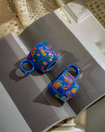 Load image into Gallery viewer, Ceramic Espresso Cups Set of 2 – Mini 3 oz Double Espresso Coffee Cups with Cute Q Handle, Floral and fruit Patterns, Small Blue Demitasse Shot Cups for Coffee Machine