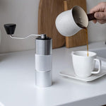 Load image into Gallery viewer, Manual Coffee Grinder by Alpaca Ventures - Stainless Steel Conical Burr Coffee Grinder Manual with Adjustable Setting Double Bearing Hand Espresso Grinder Perfect for Home, Office and Camping