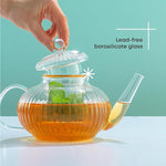 Load image into Gallery viewer, JoyJolt Fluted Glass Teapot Set 34oz, Stovetop Safe Tea Kettle, Borosilicate Clear Kettle with Removable Glass Infuser, Blooming and Loose Leaf Tea Maker and Brewer