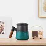 Load image into Gallery viewer, ZENS Tea Cup With Infuser and Lid for Loose Leaf Steeper, 15.2 oz Embossed Ceramic Mug With Fine Strainers, Wood Handle Large Diffusers, Accessories for Tea Lovers Gifts