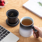 Load image into Gallery viewer, ZENS Tea Cup with Infuser and Lid, Wood Handle Loose Steeper Mug, 12 Ounces Matte Gradient Embossed Ceramic Stainer Mug for Tea Gifts, Black &amp; White