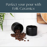 Load image into Gallery viewer, Folk Ceramics Leonard Ceramic Espresso Cups | Modern Stackable Demitasse Mugs for Espresso | Thick Walled, Handleless, Durable, Dishwasher &amp; Microwave Safe | Set of 2, 3oz | Matte Black