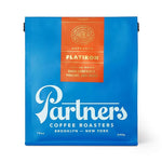 Load image into Gallery viewer, Partners Coffee Roasters, Flatiron Blend, Whole Bean Coffee - 12 Ounce - Medium-Dark Roast