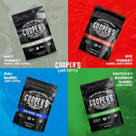 Load image into Gallery viewer, Bourbon &amp; Whiskey Barrel Aged Coffee Box Set - 4-Bag Roasted Coffee Sampler - Bourbon Colombian, Malt Whiskey Sumatra, Rye Whiskey Ethiopian, Rum Barrel Rwanda, (Ground, 4 Ounce (Pack of 4))