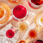 Load image into Gallery viewer, Grace Farms HERBAL TEA VARIETY Box (12 Enveloped Sachets) | 4 Naturally Sweet, Caffeine Free Flavors | Chamomile Citrus, Hibiscus Orange, Spearmint Rose, &amp; Rooibos Chai | Organic, Fair Trade &amp; Kosher | Gives Back 100% of Profits