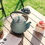 Load image into Gallery viewer, Cast Iron Teapot, 32oz Tea Kettle with Infuser for Stove Top, Sakura Blossom Pattern Japanese Tea Pot for Tea &amp; Coffee Coated with Enameled Interior, Silicone Handle 950ml Blue