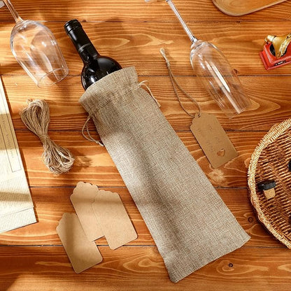 Windyun 100Pcs Burlap Wine Bags Drawstring Wine Bottle Gift Sacks with Tags 5.9 x 13.8 Inch Jute Burlap Plain Wine Bags for Wedding Birthday Blind Tastings Christmas Travel Party (Natural Color)