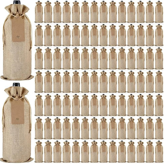 Windyun 100Pcs Burlap Wine Bags Drawstring Wine Bottle Gift Sacks with Tags 5.9 x 13.8 Inch Jute Burlap Plain Wine Bags for Wedding Birthday Blind Tastings Christmas Travel Party (Natural Color)